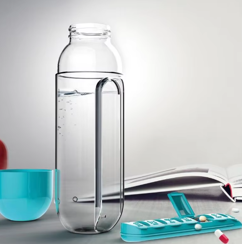 Botella de agua con pastillero